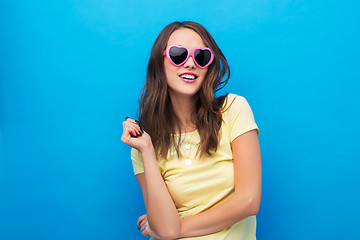 Image showing teenage girl in heart-shaped sunglasses