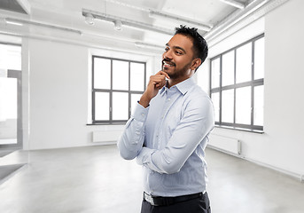 Image showing indian businessman or realtor in empty office room