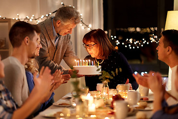 Image showing happy family having birthday party at home