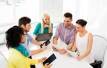 Image showing creative team with table computers in office