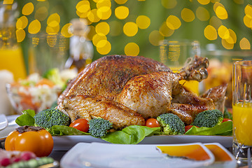 Image showing Roasted turkey on festive table for Thanksgiving celebration