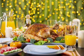 Image showing Roasted turkey on festive table for Thanksgiving celebration