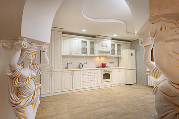 Image showing Luxury modern white and beige kitchen interior