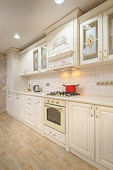 Image showing Luxury modern white and beige kitchen interior