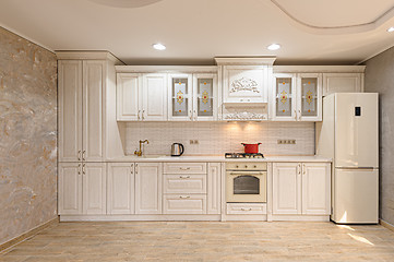 Image showing Luxury modern white and beige kitchen interior