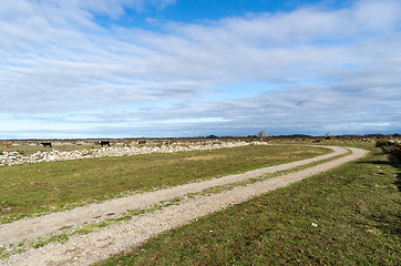 Image showing Winding country road in a wide open plain grassland