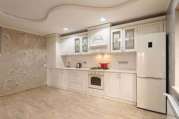 Image showing Luxury modern white and beige kitchen interior