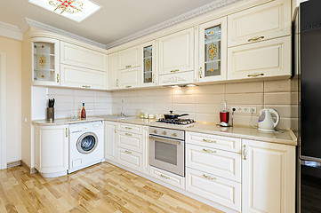 Image showing Luxury modern beige and white kitchen interior