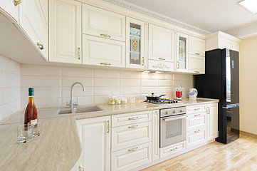 Image showing Luxury modern beige and white kitchen interior