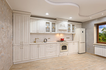 Image showing Luxury modern white and beige kitchen interior