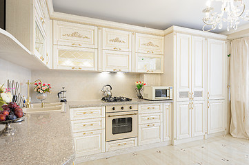 Image showing Luxury modern beige and cream colored kitchen interior