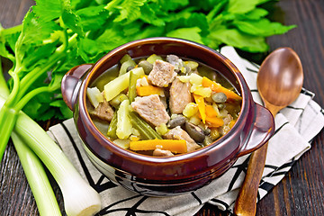 Image showing Soup Eintopf in clay bowl on napkin