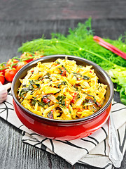 Image showing Cabbage stew with chard in bowl on black board