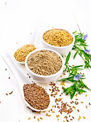 Image showing Flour linen in bowl with seeds on white wooden board