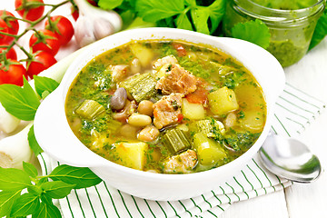 Image showing Soup with pisto sauce in bowl on light board