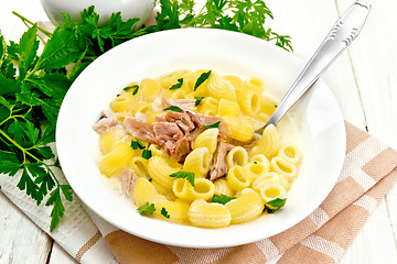 Image showing Soup creamy of chicken and pasta in plate on light board