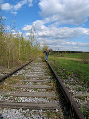 Image showing Girl on rail