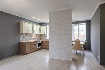 Image showing Luxury modern provence styled grey, pink and cream kitchen interior