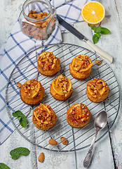 Image showing Homemade cupcakes with caramelized oranges.