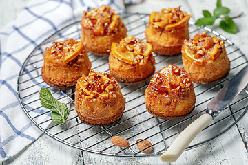 Image showing Delicious cupcakes with orange and almonds.