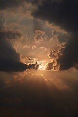 Image showing Sunset sky with dark clouds