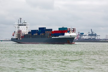 Image showing Ship carrying containers through Rotterdam