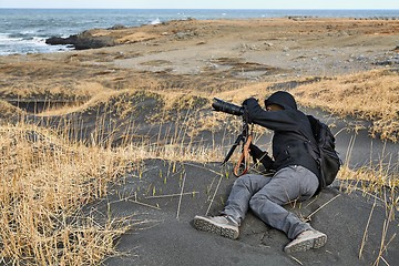 Image showing Photographer in Iceland, black sand beach