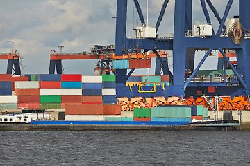 Image showing Loading containers on a ship