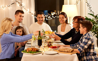 Image showing happy family having dinner party at home