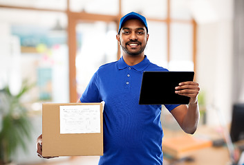 Image showing indian delivery man with tablet pc and parcel box