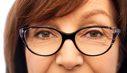 Image showing close up of face of senior woman in glasses