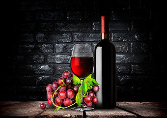 Image showing Bottle red wine and grapes