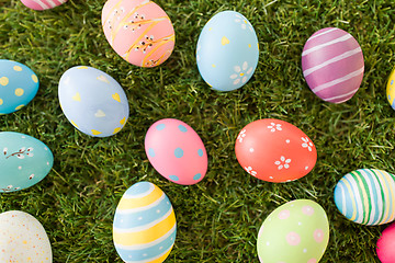 Image showing colored easter eggs on artificial grass