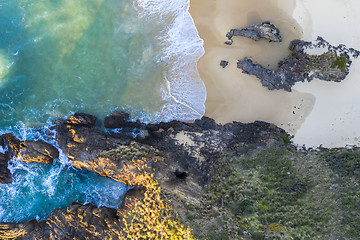 Image showing Beach, water tunnel and secret window high in the cliff