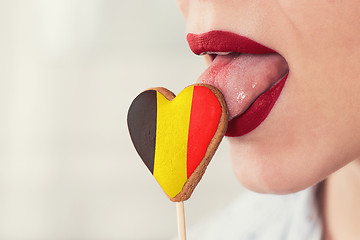 Image showing Lips and cookie with flag