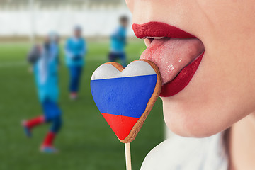 Image showing Lips and cookie with flag