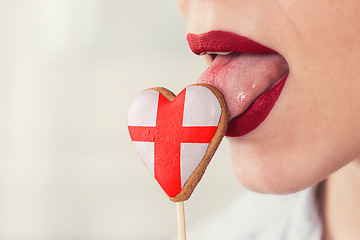 Image showing Lips and cookie with flag