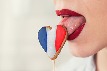 Image showing Lips and cookie with flag