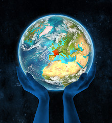 Image showing France on planet Earth in hands