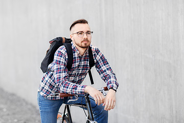 Image showing hipster man with fixed gear bike and backpack