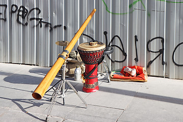 Image showing Didgeridoo and jembe drum on the city street