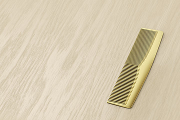 Image showing Gold hair comb