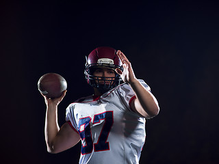 Image showing american football player throwing rugby ball