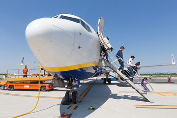 Image showing Trieste airport, Italy - 20 April 2018: People boarding Ryanair plane on Friuli Venezia Giulia Airport in Trieste, italy on April 20th, 2018. Ryanair is the biggest low-cost airline company in Europe