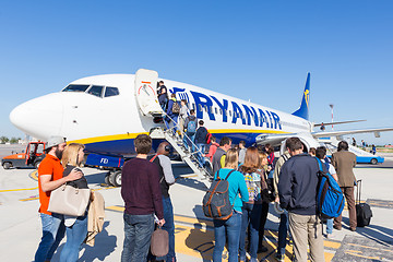 Image showing Trieste airport, Italy - 20 April 2018: People boarding Ryanair plane on Friuli Venezia Giulia Airport in Trieste, italy on April 20th, 2018. Ryanair is the biggest low-cost airline company in Europe