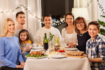 Image showing happy family having dinner party at home