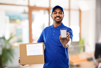 Image showing indian delivery man with smartphone and parcel box