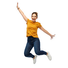 Image showing happy young woman or teenage girl jumping