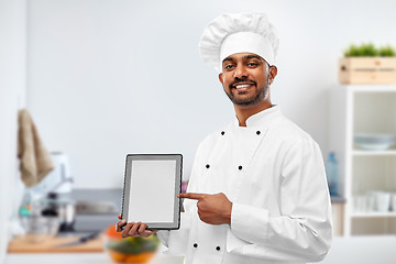 Image showing happy indian chef with tablet computer at kitchen