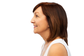 Image showing profile of smiling senior woman over white